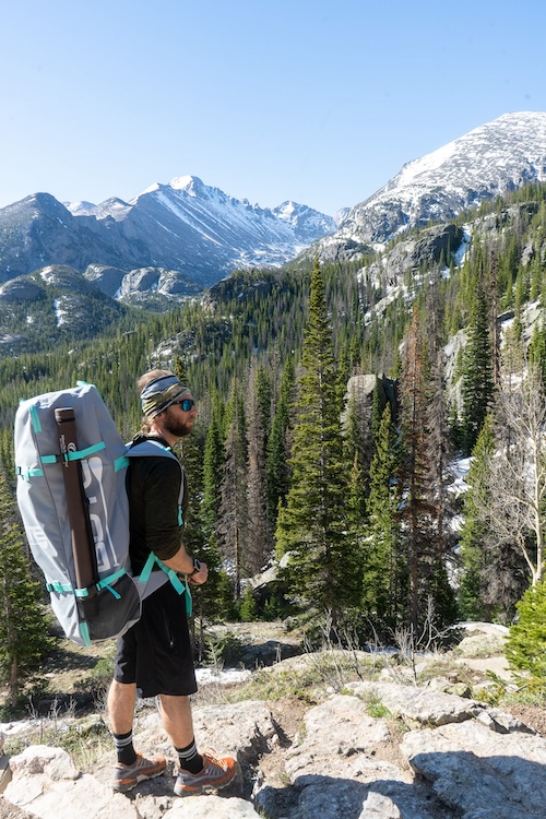 Carrying fly rod on backpack